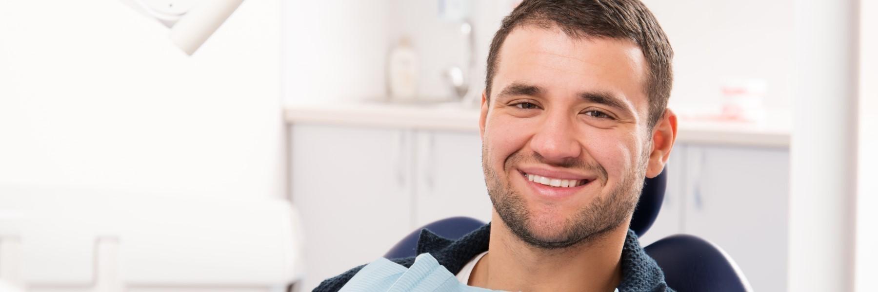 Man smiling in dental chair | Nutley NJ Dentist
